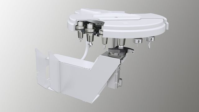 Instead of linear changer an 18-position traveling disk tool changer can be ordered. Instead of linear changer an 18-position traveling disk tool changer can be ordered.